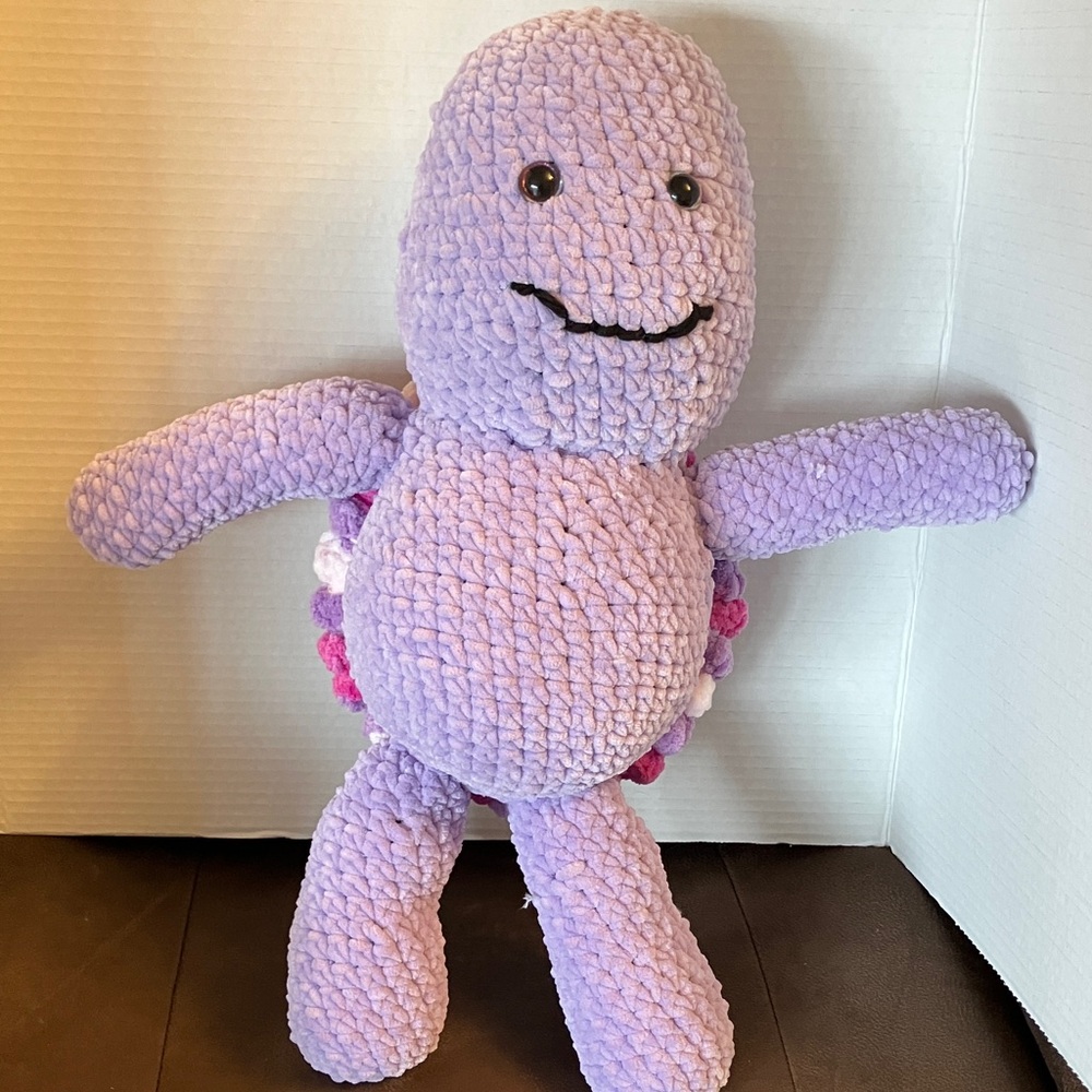 Handmade crocheted Purple Plush Toy Turtle.
New. 21” long. Acrylic yarn.